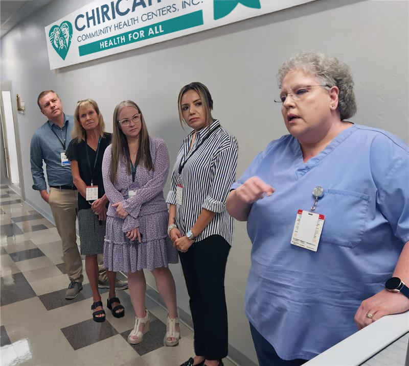 Banner Team being shown the AccuVax Machine